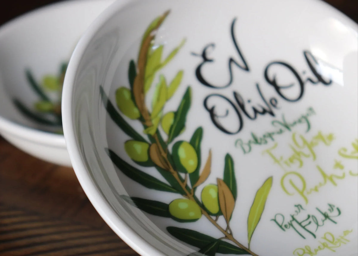 Close-up of printed olive branch design inside EVOO dipping dish