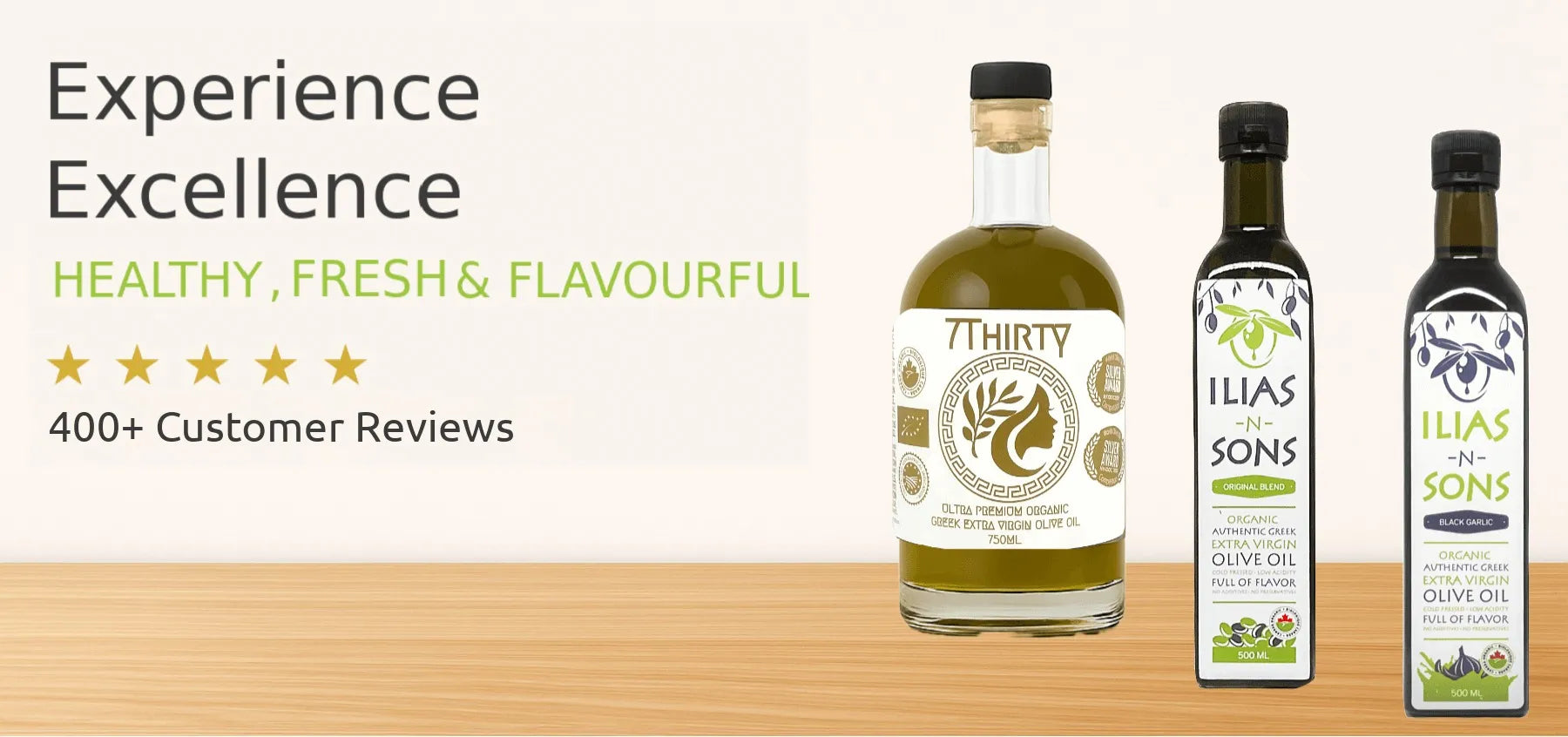 Ilias and Sons - Medicinal High Polyphenol Greek Extra Virgin Olive Oil - Three bottles of olive oil on a wooden surface with a white background